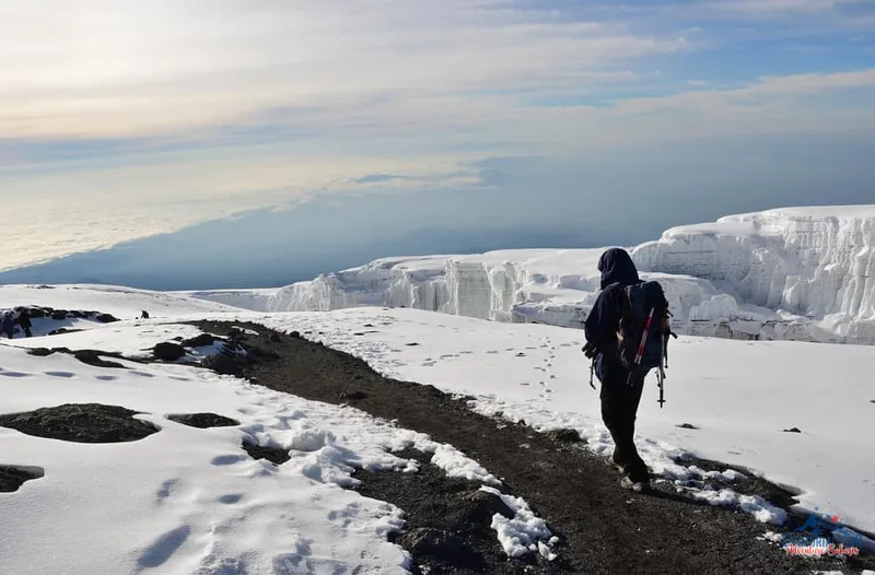 Walk on snow covering the peaks of Africa’s highest mountain